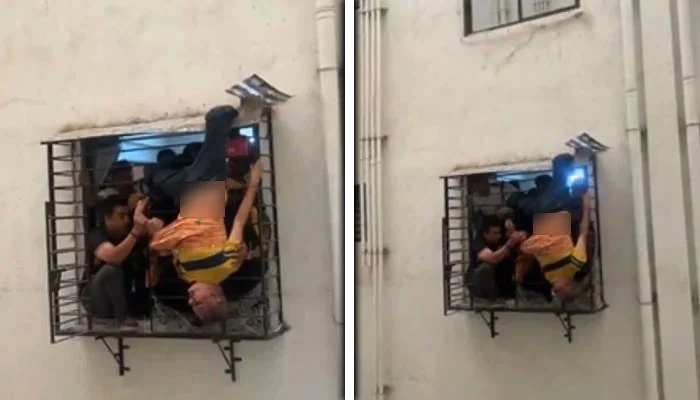 نیند کے دوران 10ویں منزل سے گرنے والا شخص دو منزل نیچے جالی میں پھنس گیا